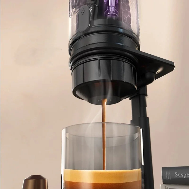 Handy Travel Espresso Maker brewing barista-quality coffee into a glass for on-the-go convenience.